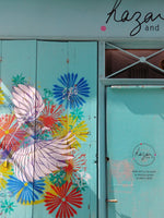 boutique turquoise rue du château, jeunes créateurs à paris 14 avec une fresque street art réalisé par stew Earth